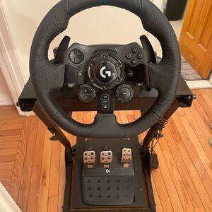 Selling this Logitech steering wheel and mount